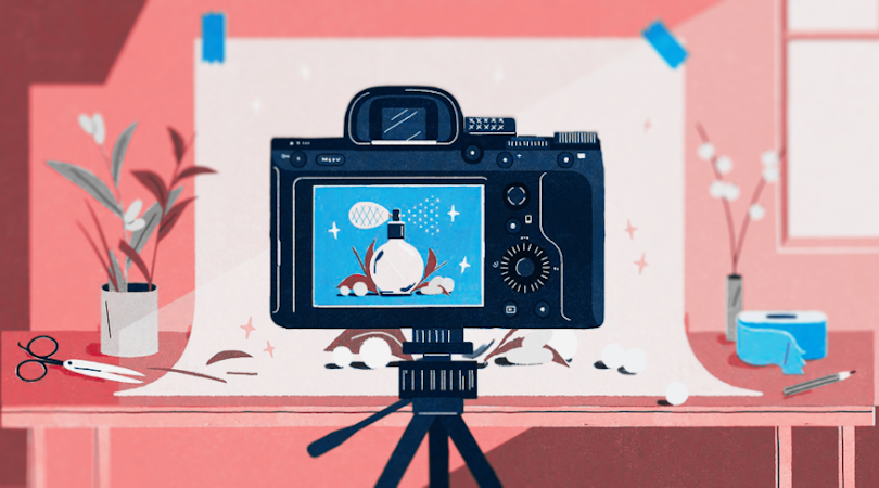 illustration of a camera taking a picture of a perfume