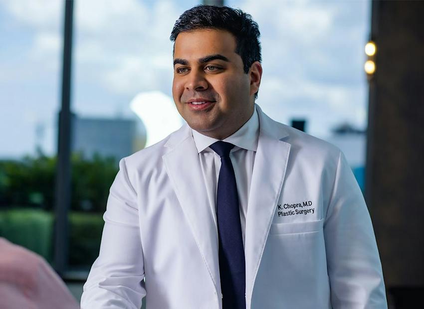 Dr. Chopra in white suit