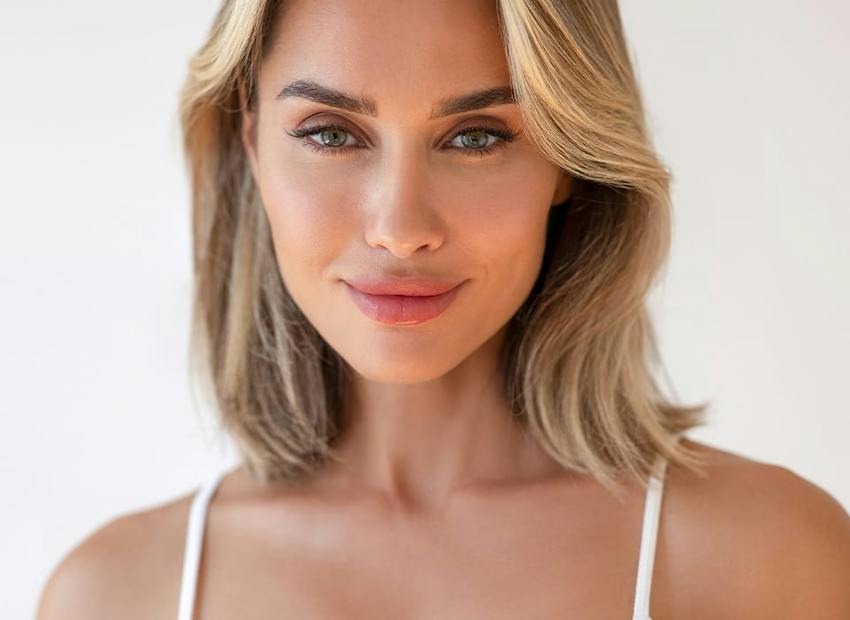 woman smiling forward