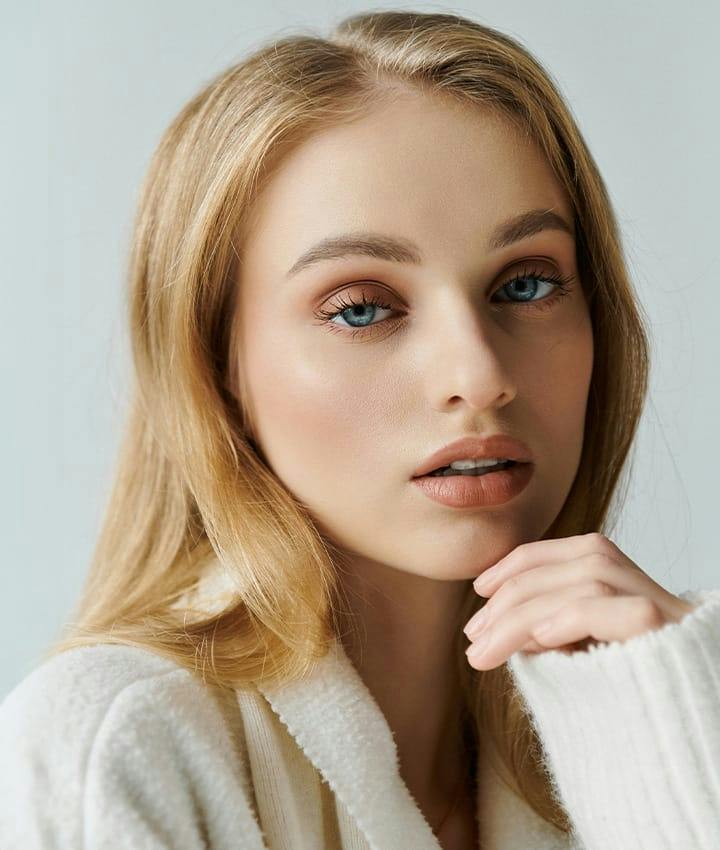 woman in white cardigan