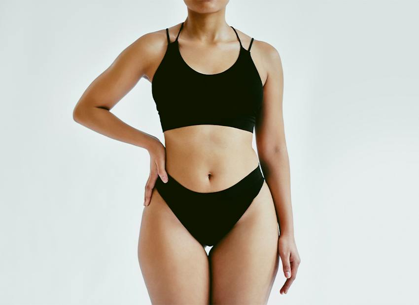 woman in black undergarments