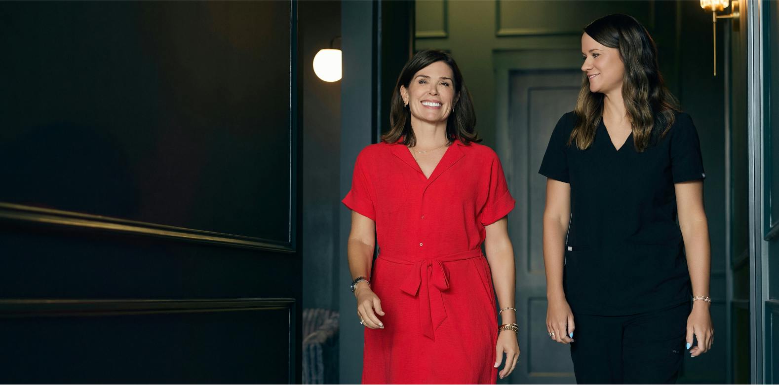 Two team members in the practice hallway