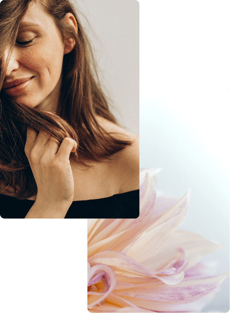 Woman smiling | orange flowers