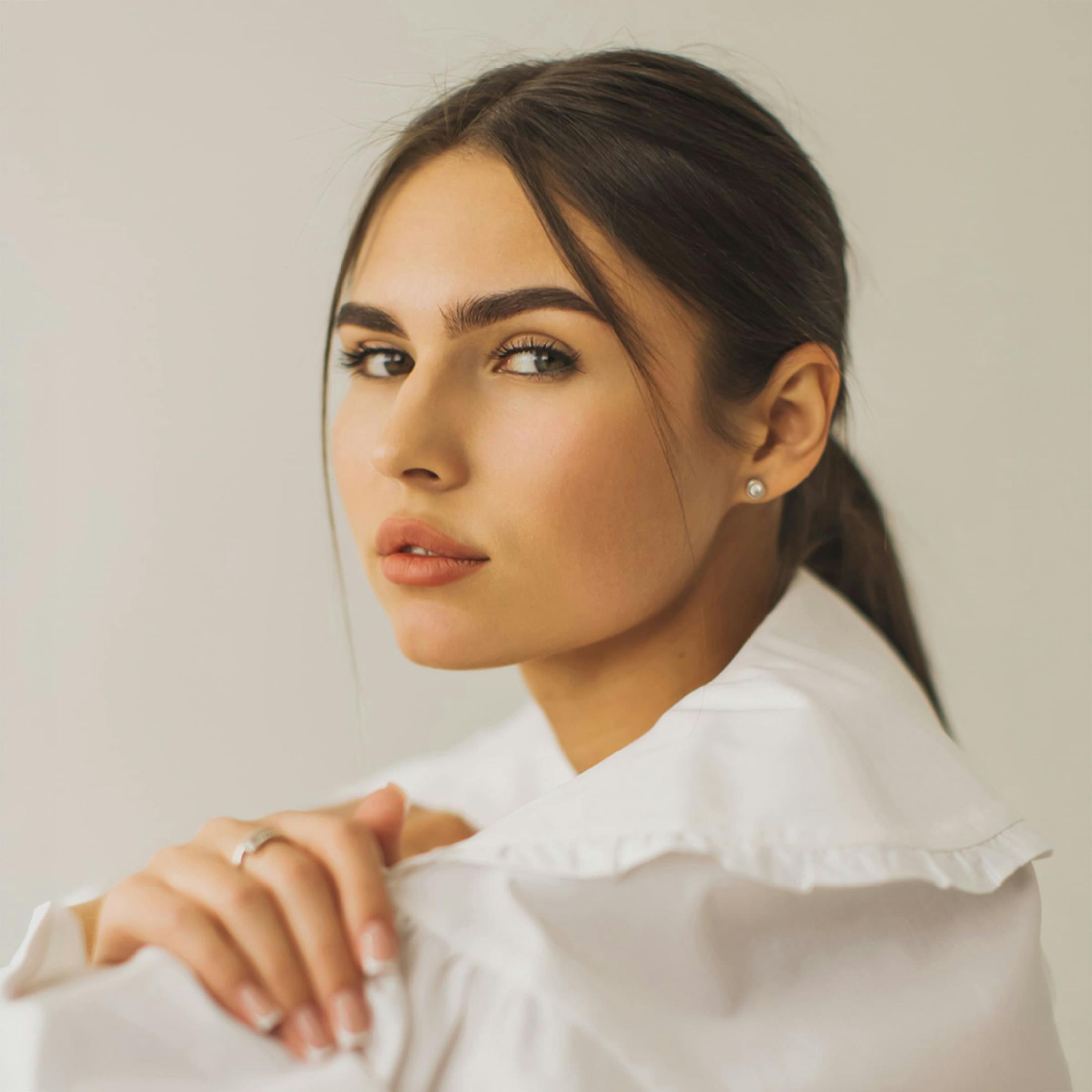 woman with hand on arm