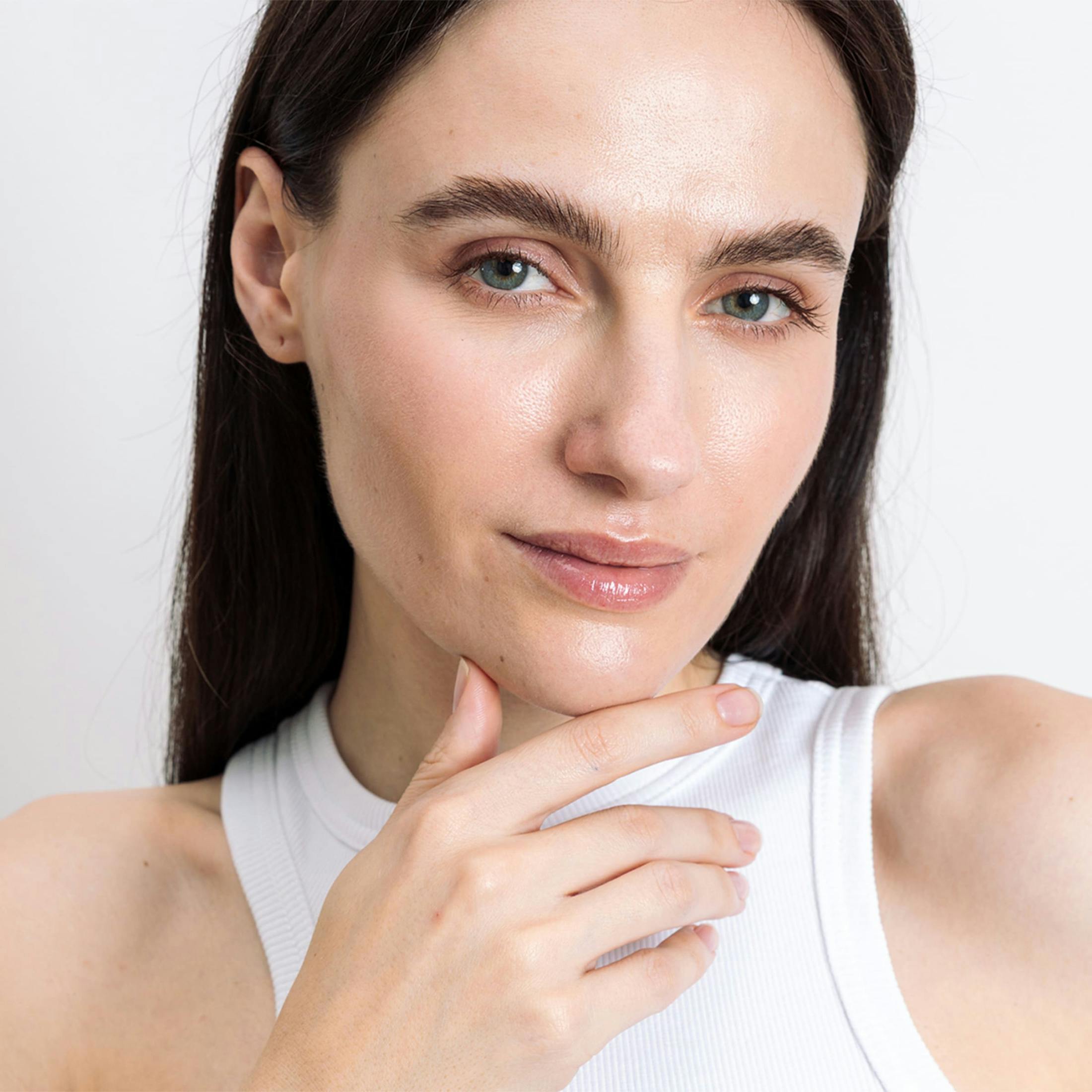 Woman touching her chin