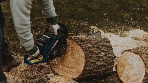 A wood chainsaw at work