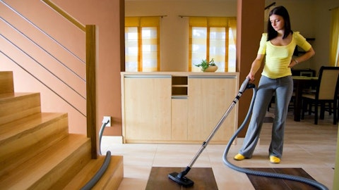 woman-cleaning-with-a-central-vacuum cleaner
