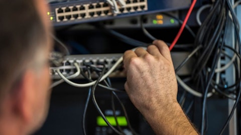 IT consultant works with network switches