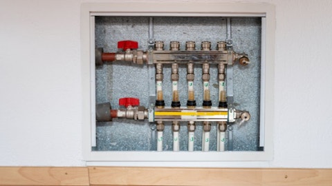 Sistem podnog grejanja u zidu iza revizionih vrata Sistem podnog grejanja u zidu iza revizionih vrata