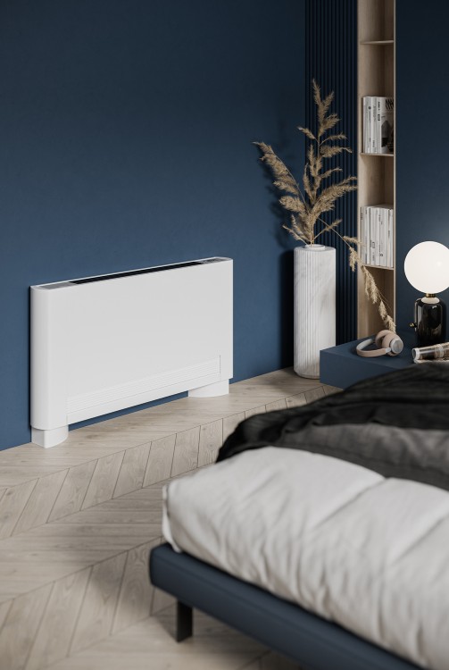 Niebieska stylowa sypialnia z łóżkiem klimakonwektorem Purmo Vido S2 na ziemi