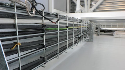 Cable routes with trays and mounting brackets on the roof of the building