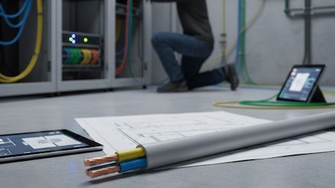 Przewód elektryczny YDYp leżący na planach budowlanych