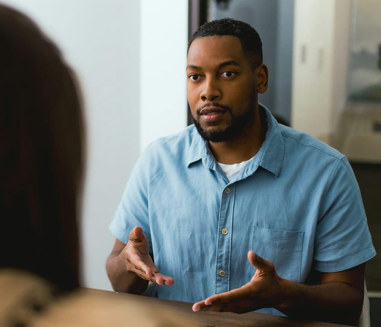 man meeting with a lawyer