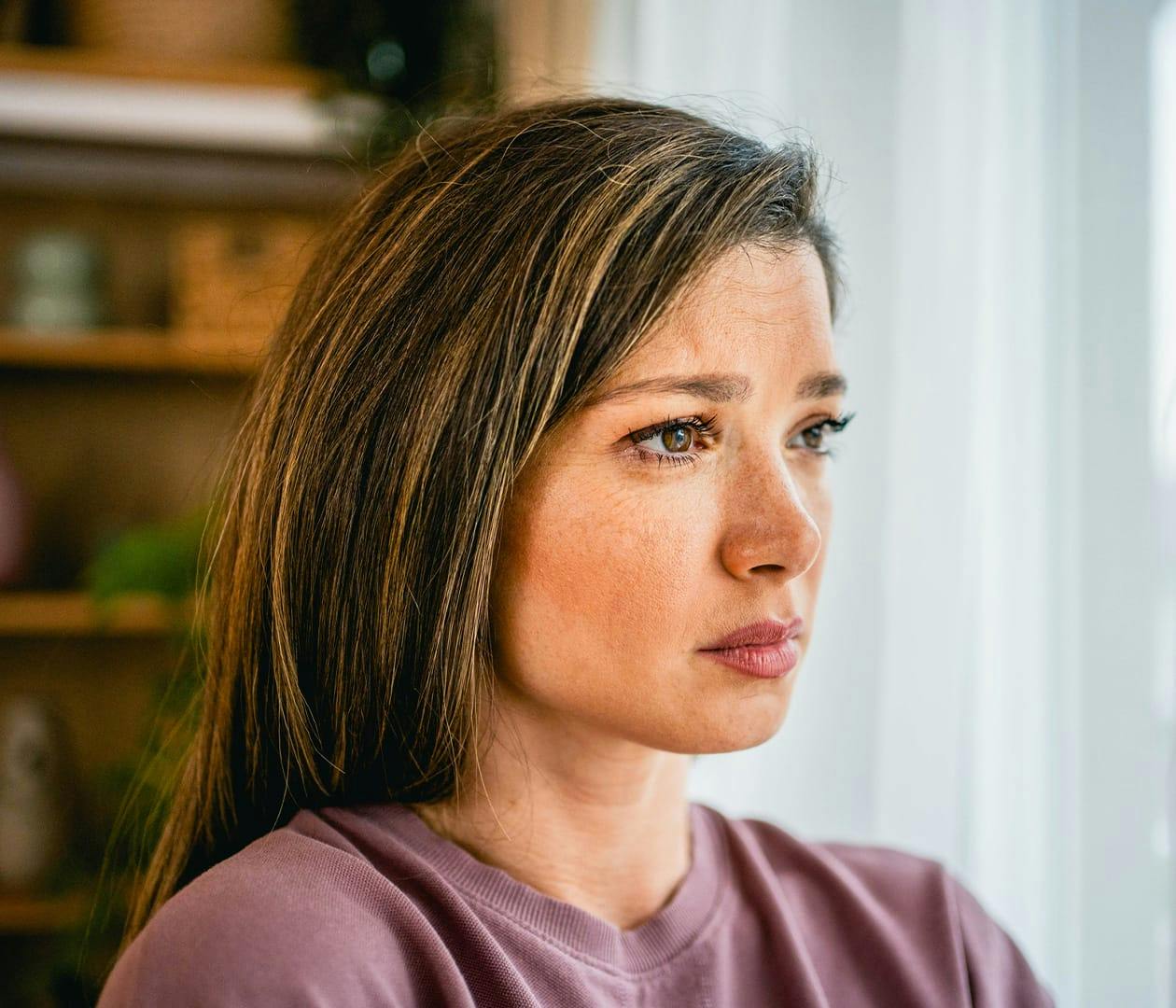 close up of woman's face looking distressed