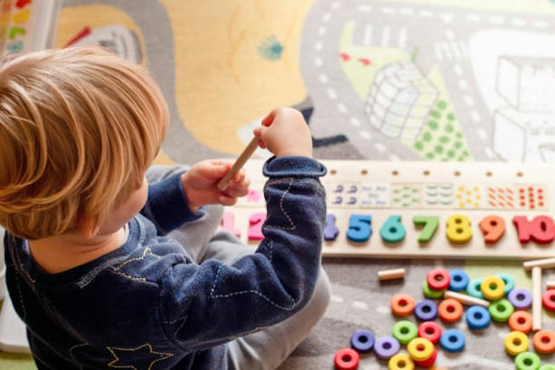 A child playing with toys