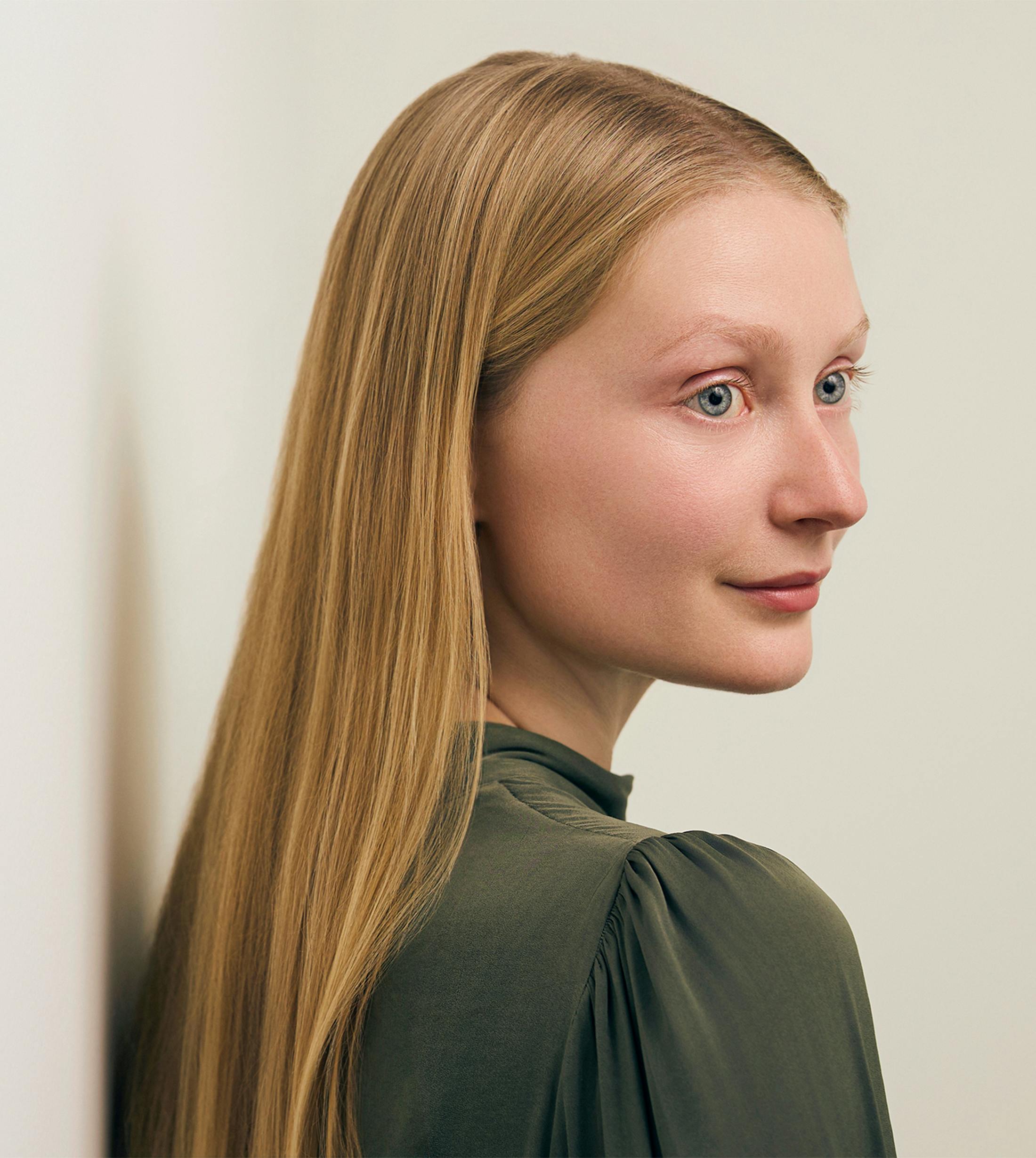 woman looking over her shoulder