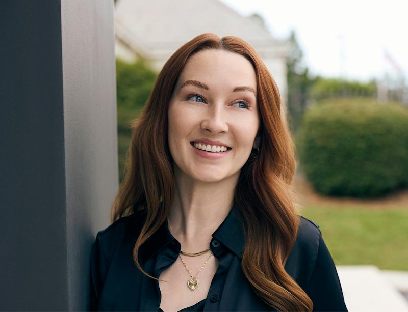 woman smiling to the side