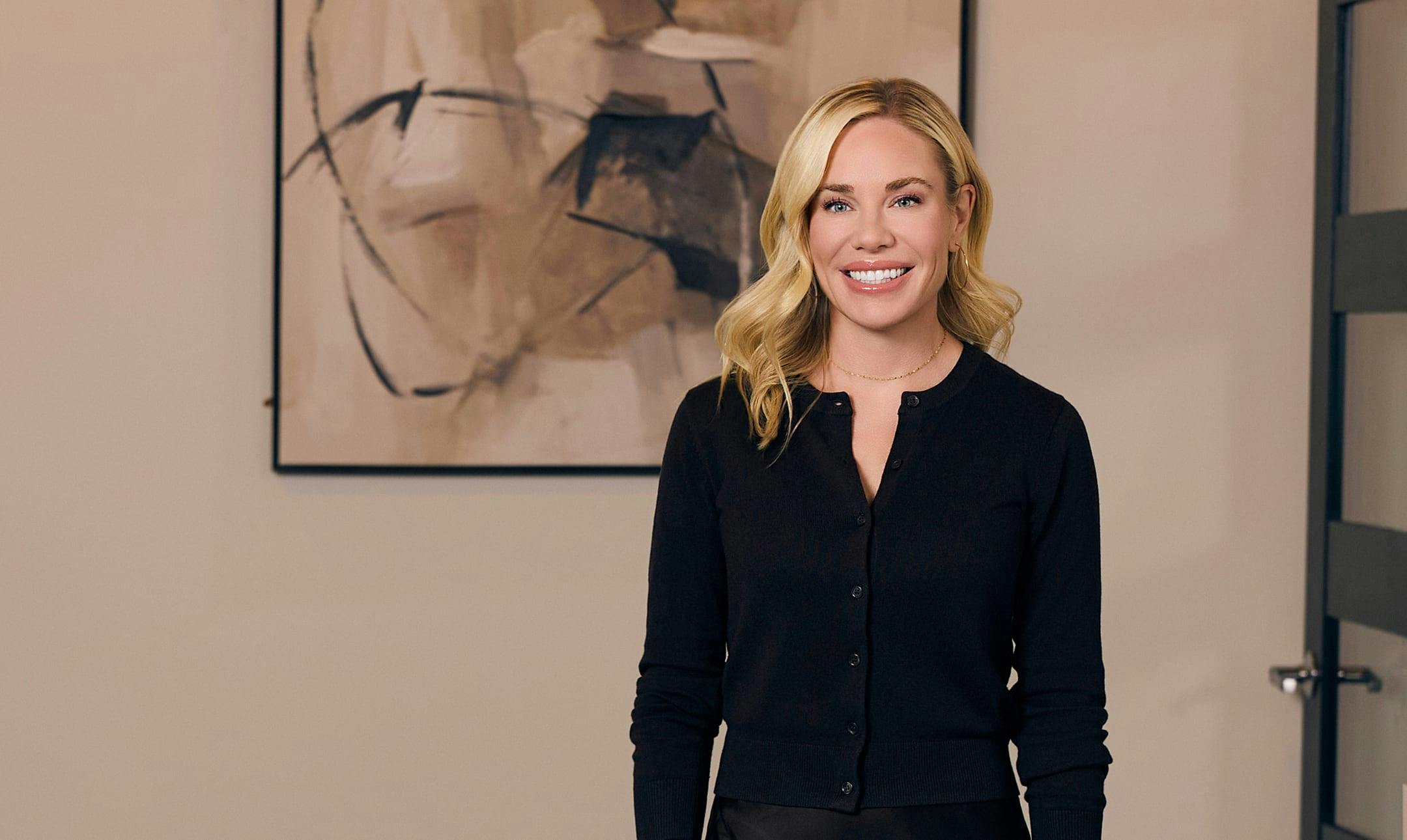 woman with blonde hair smiling