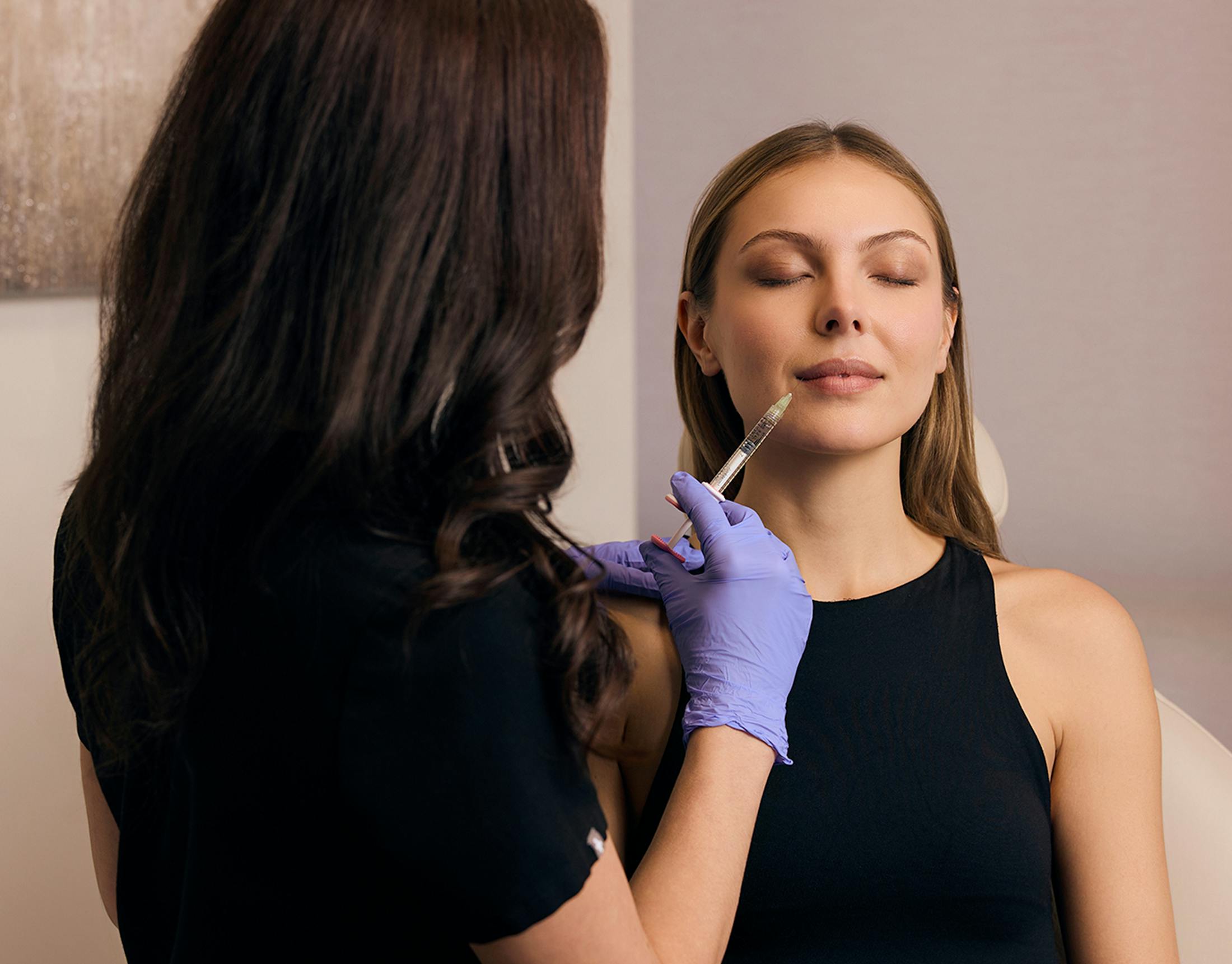 Woman getting lip filler