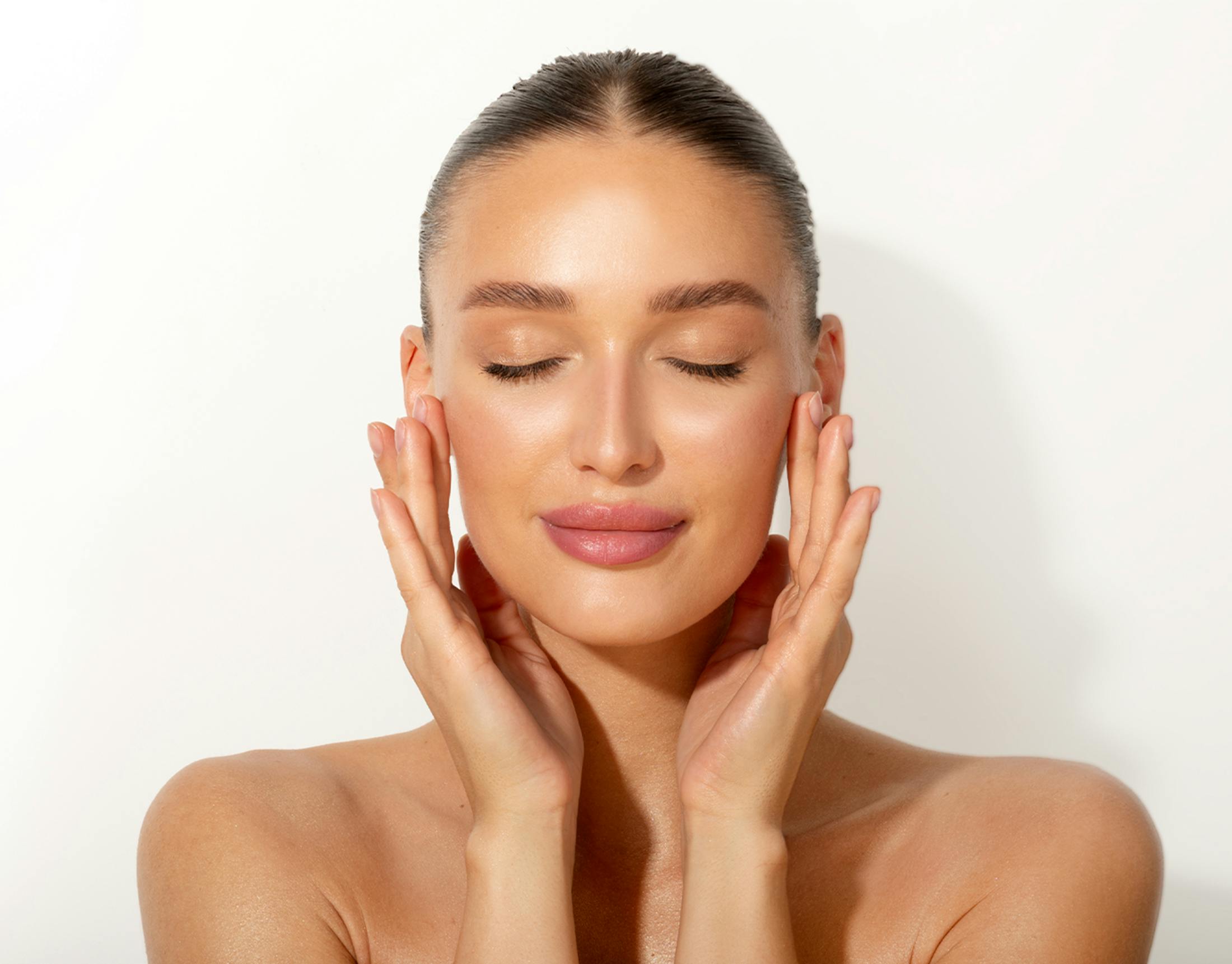 Woman touching her face