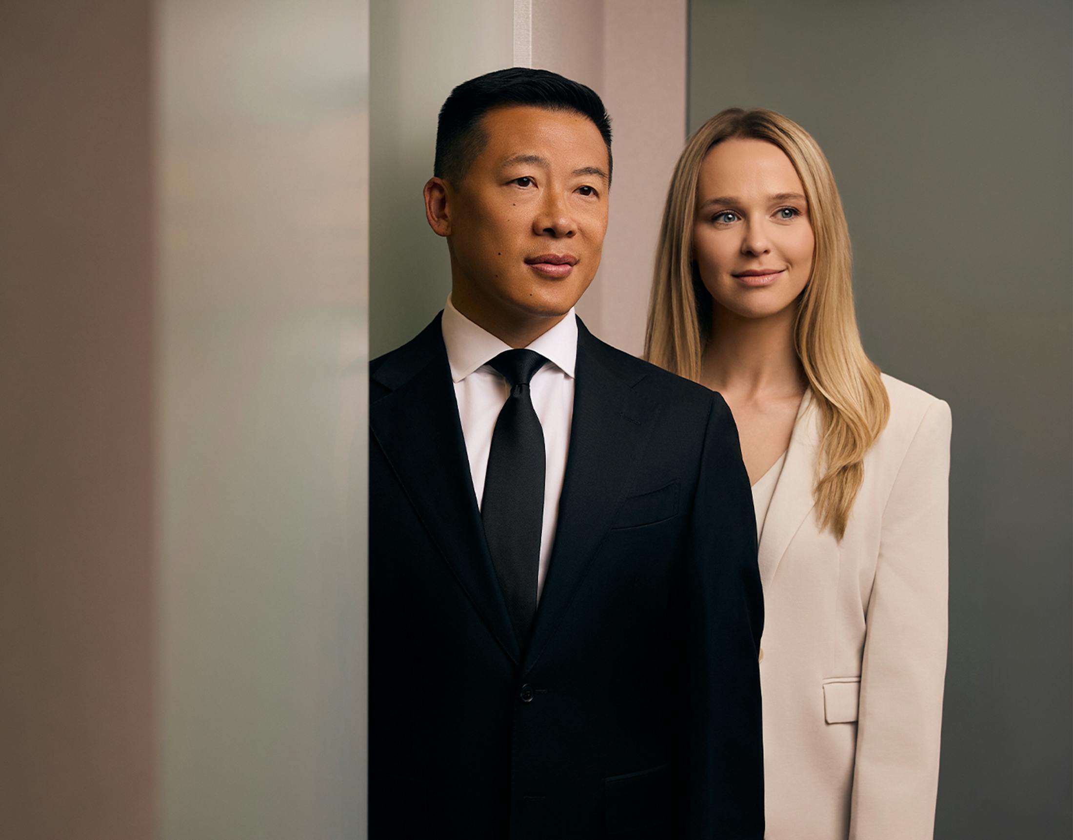 A man and woman smiling