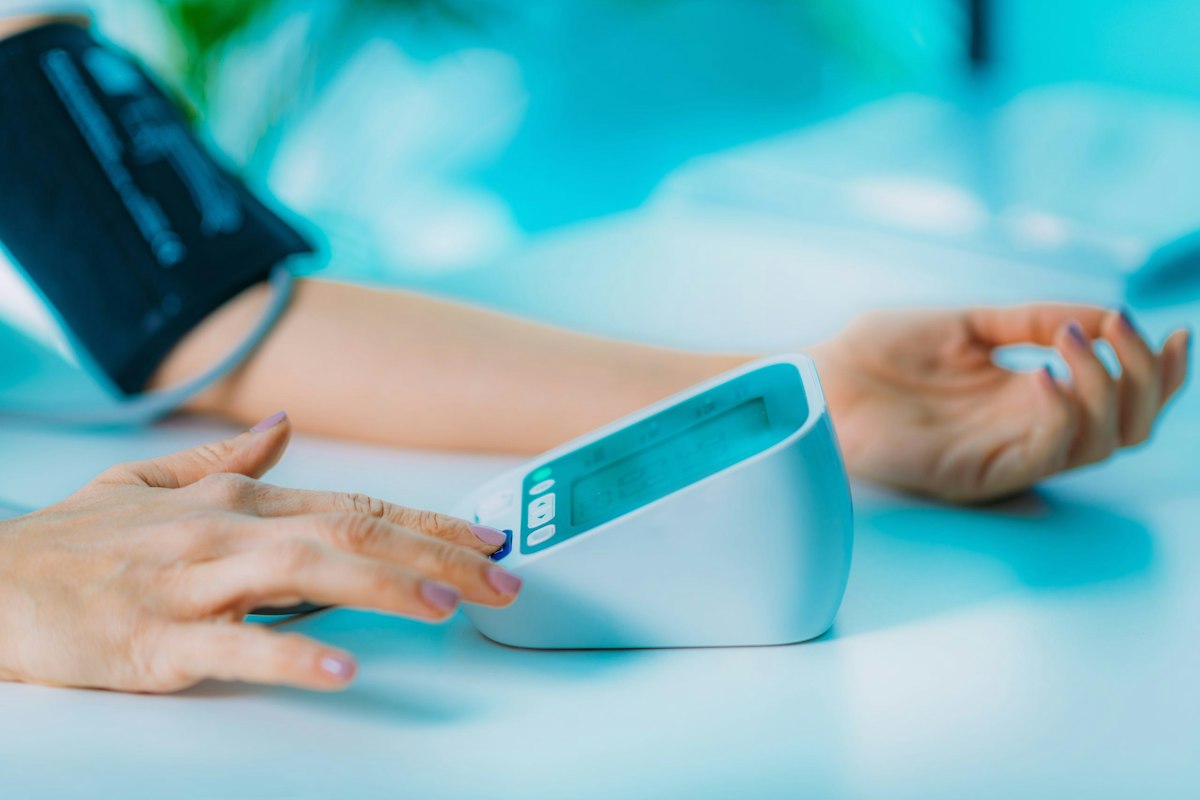 Patient monitoring improved blood pressure after personalized hypertension treatment and ongoing care at Geneva Med Spa in Alpharetta