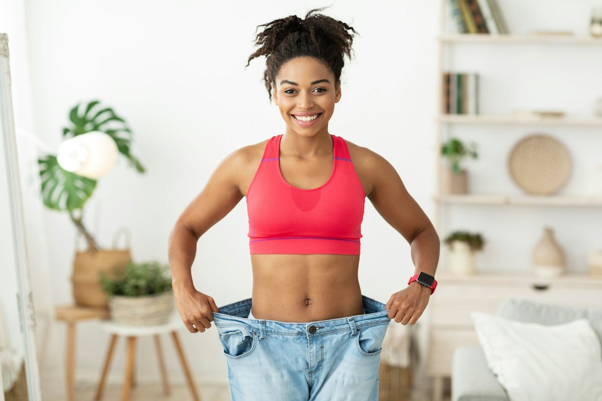 Patient showing visible body composition changes months after medically supervised weight loss with Geneva Primary Care and Med Spa