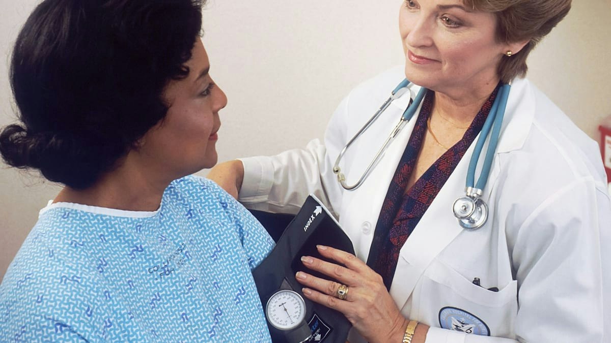 Patient discussing ADHD medication timeline with Geneva Med provider using stethoscope, gaining clarity on expectations