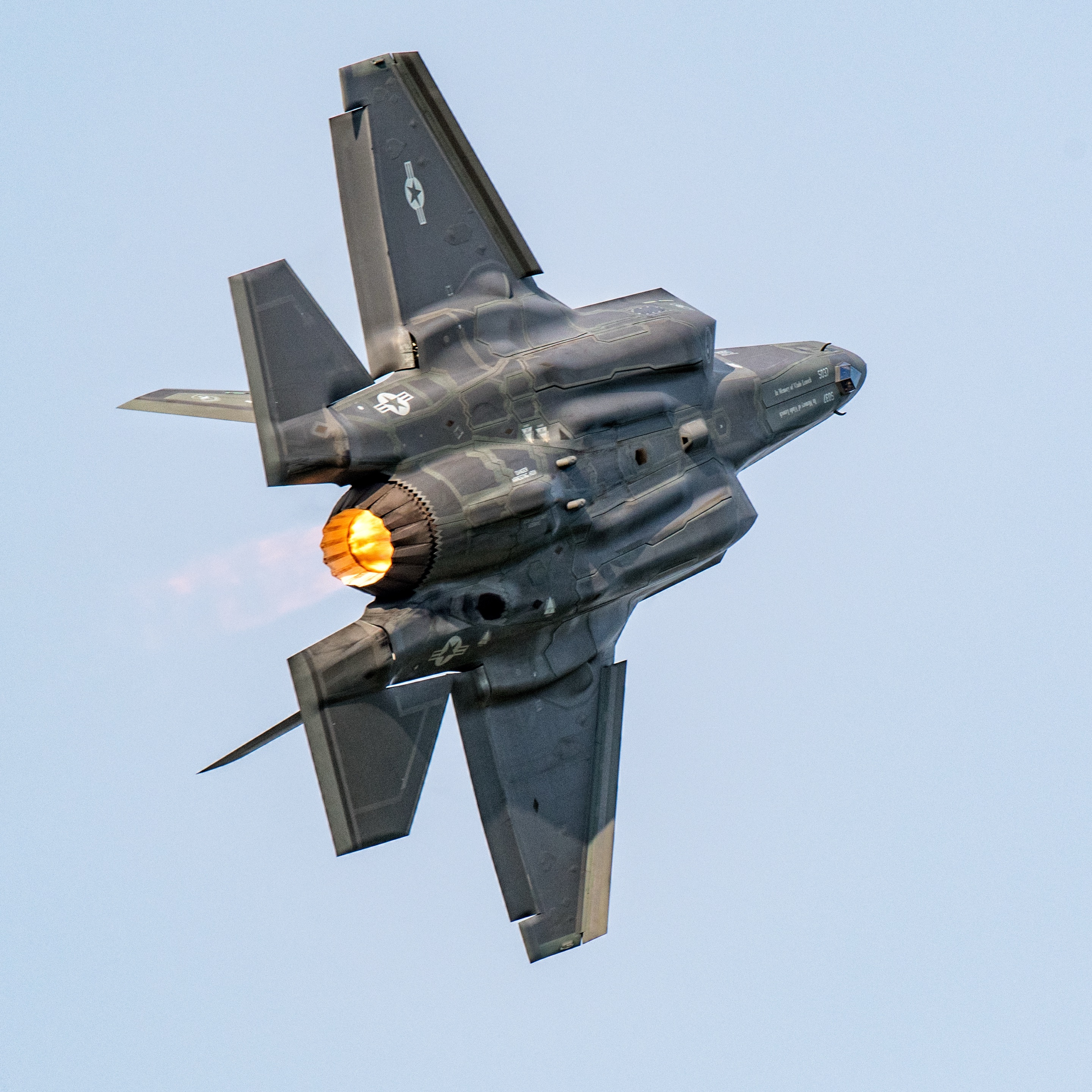 F-35 fighter jet climbing with its afterburner lit