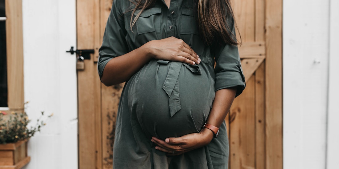 pregnant lady holding bump