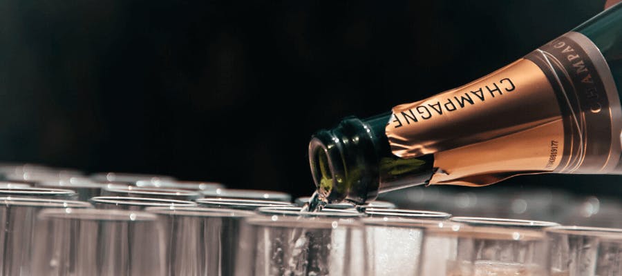 wine pouring into a glass wine pouring into a glass