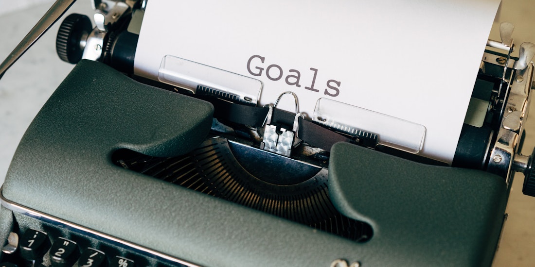 Typewriter with 'goals' typed on a piece of paper