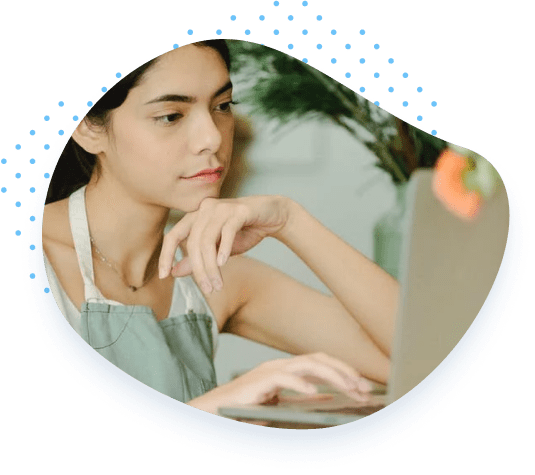 woman looking at laptop