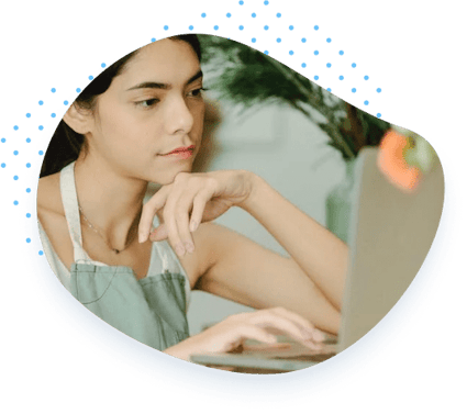 woman looking at laptop