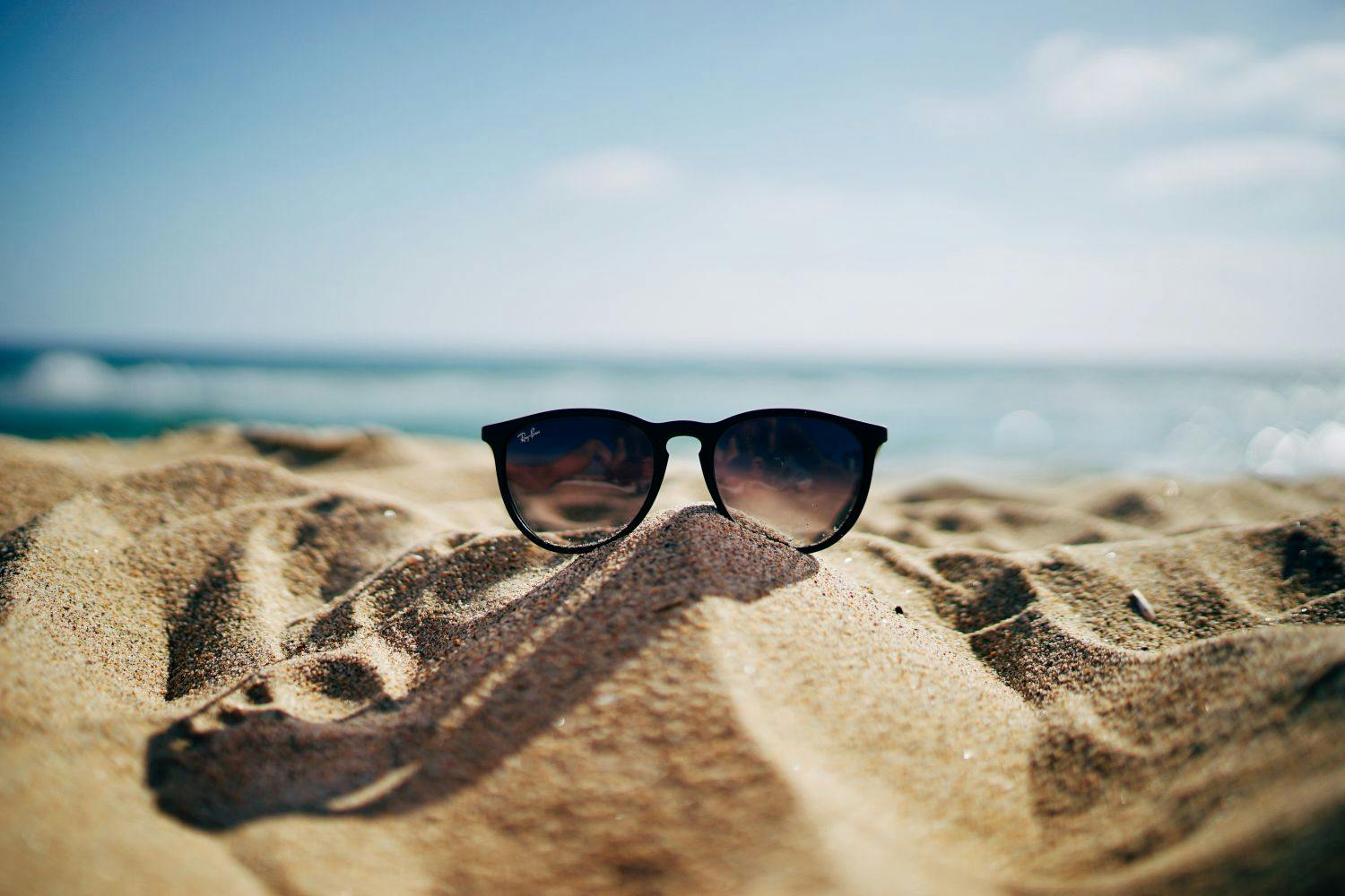 sandcastle with glasses