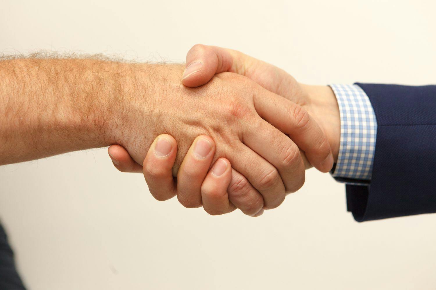 male hands shaking male hands shaking