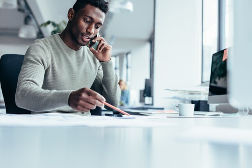 an employee speaking to a client on the phone