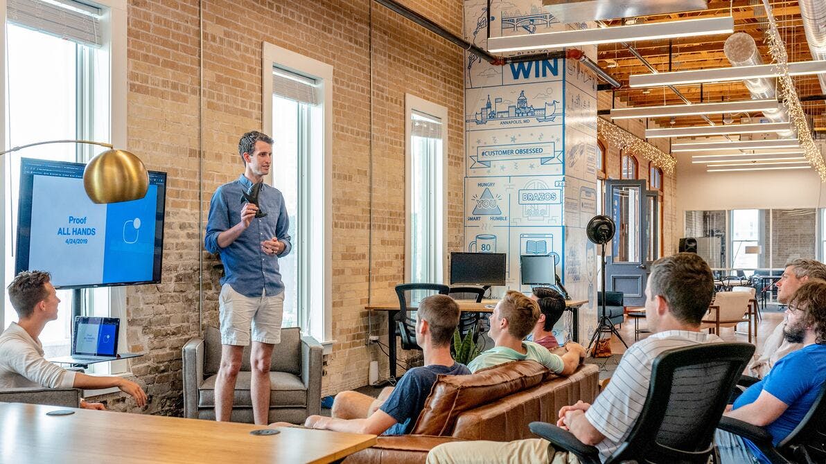Company meeting and presentation Person giving a meeting on company culture