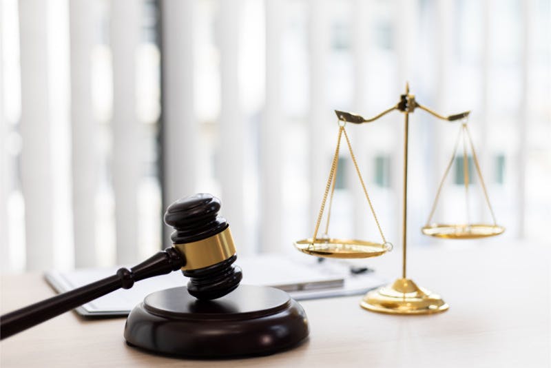 Justice Scales and gavel Image of a judges hammer and a set of justice scales