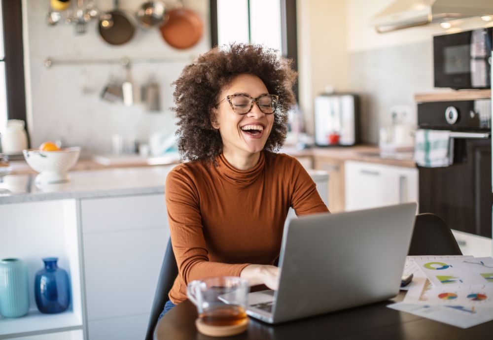 Person working in the kitchen feeling happy and motivated