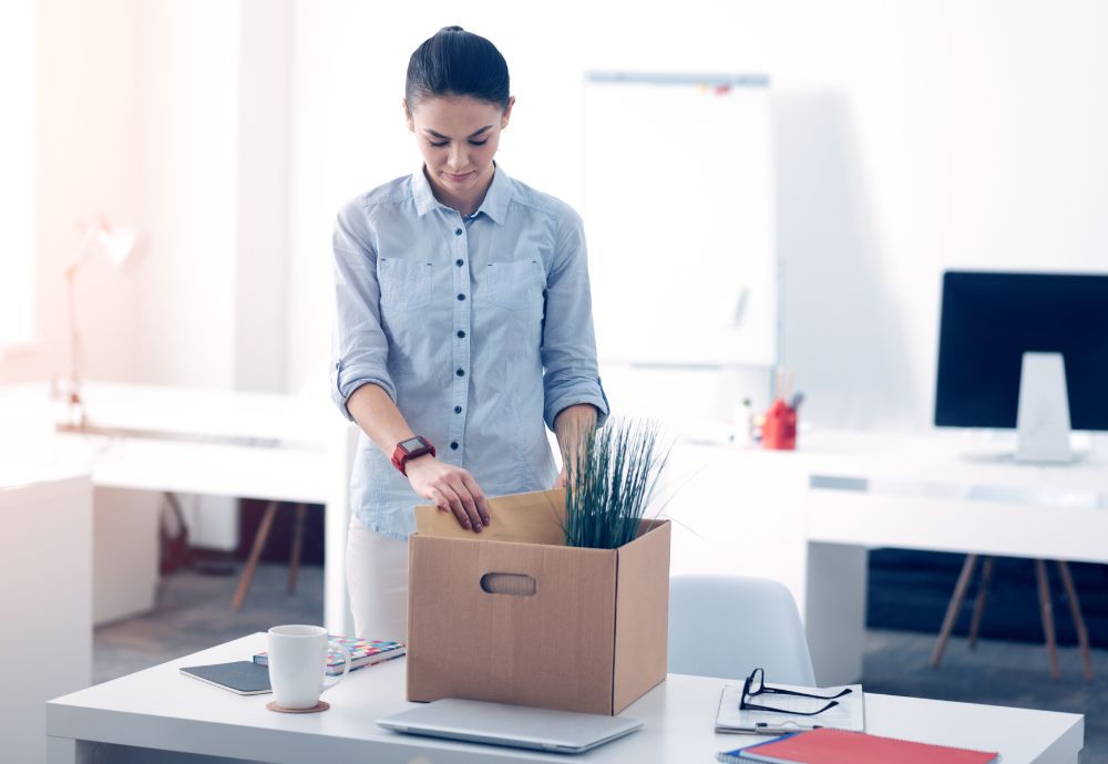 Person leaving there job by packing up their personal belongings