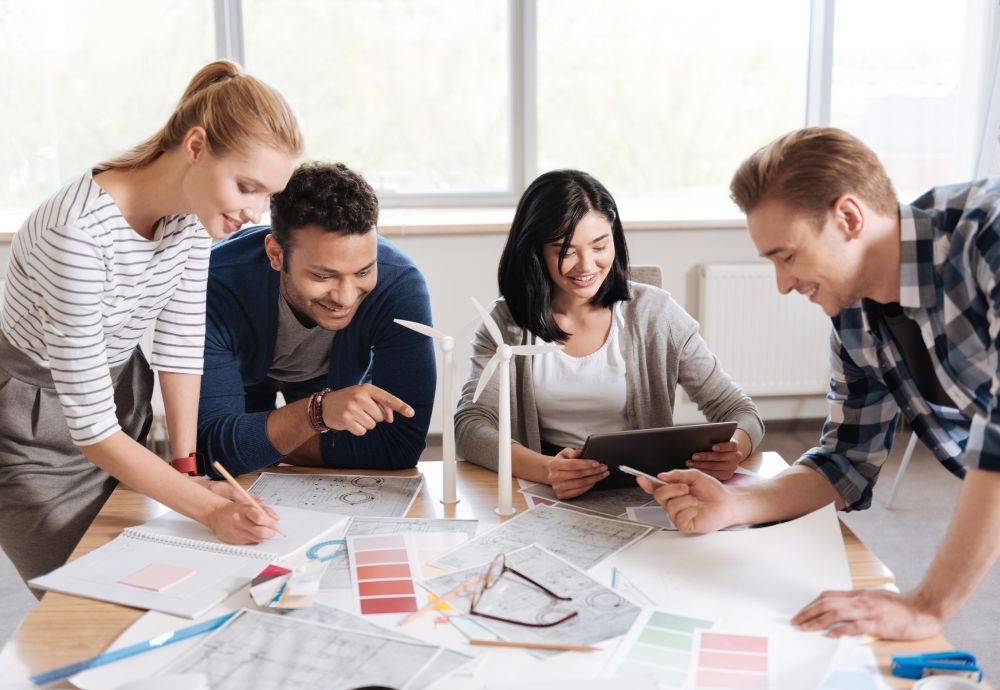 4 people having a work meeting