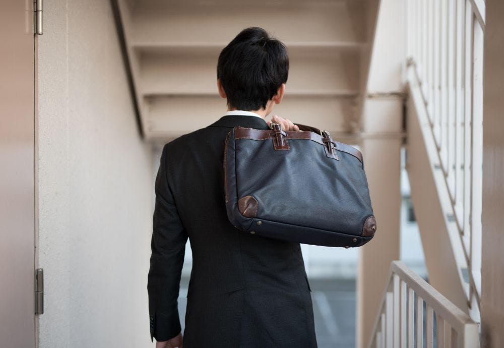 Person leaving work after serving notice period Person leaving work after serving notice period