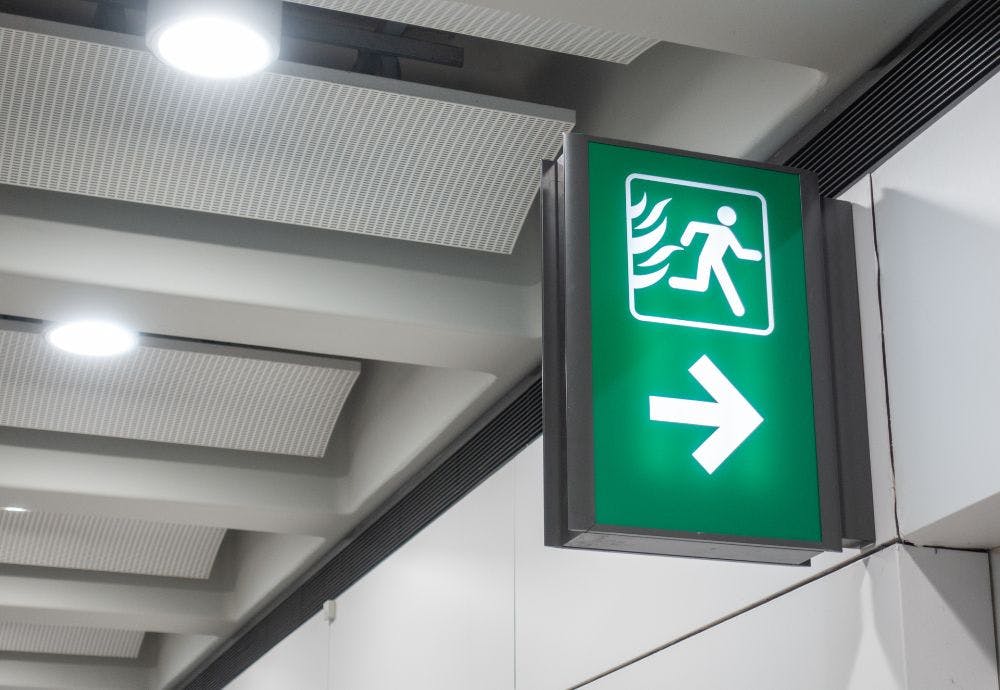 A fire exit sign added into an office