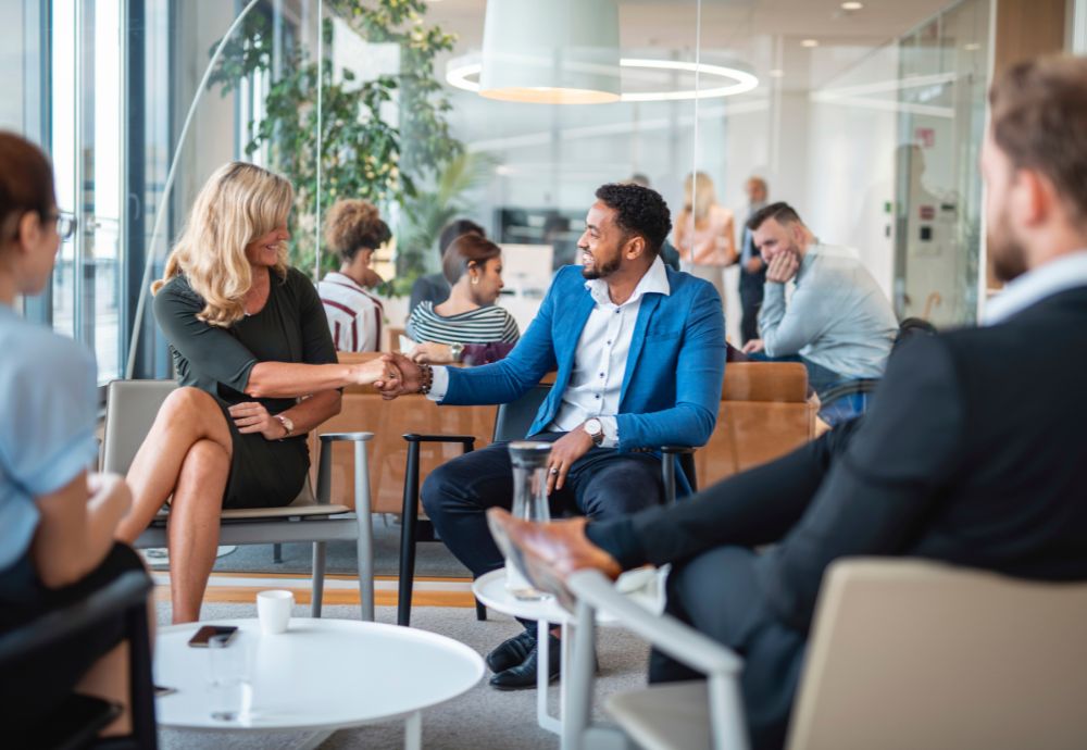 Two people just starting a new job waiting for the induction period