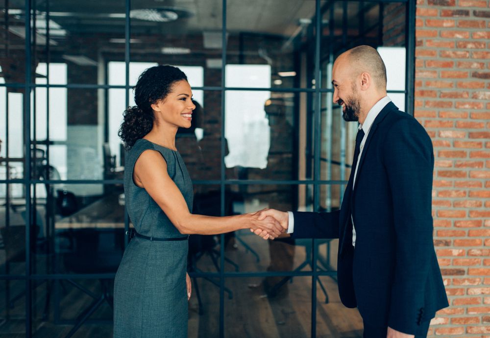 gender inequality at workplace essay 250 words Two people meeting with a handshake