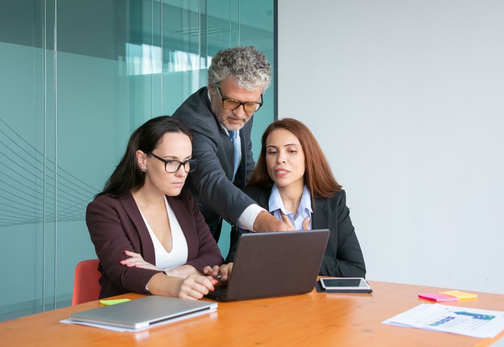 Someone Micromanaging two employees overseeing their work