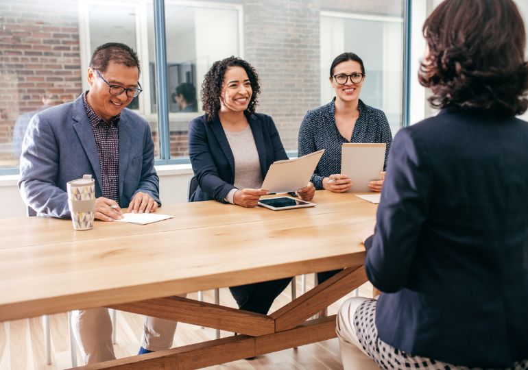 4 people taking part in a casual interview