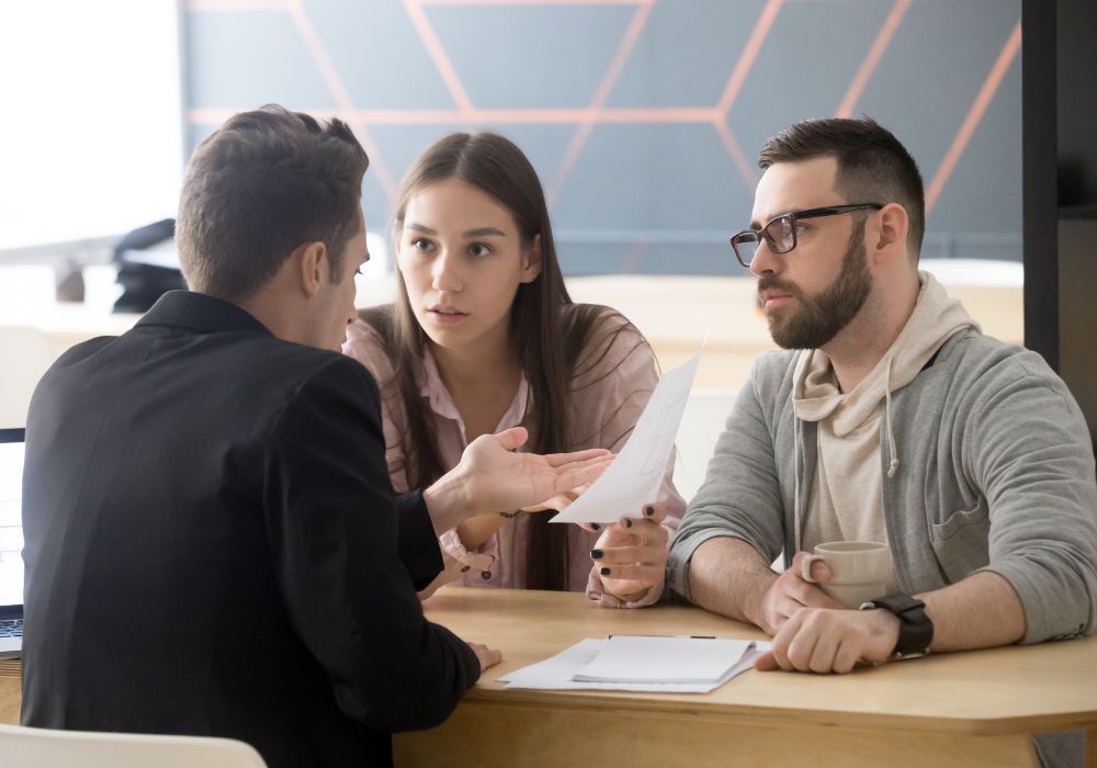 3 people trying to resolve an informal grievance