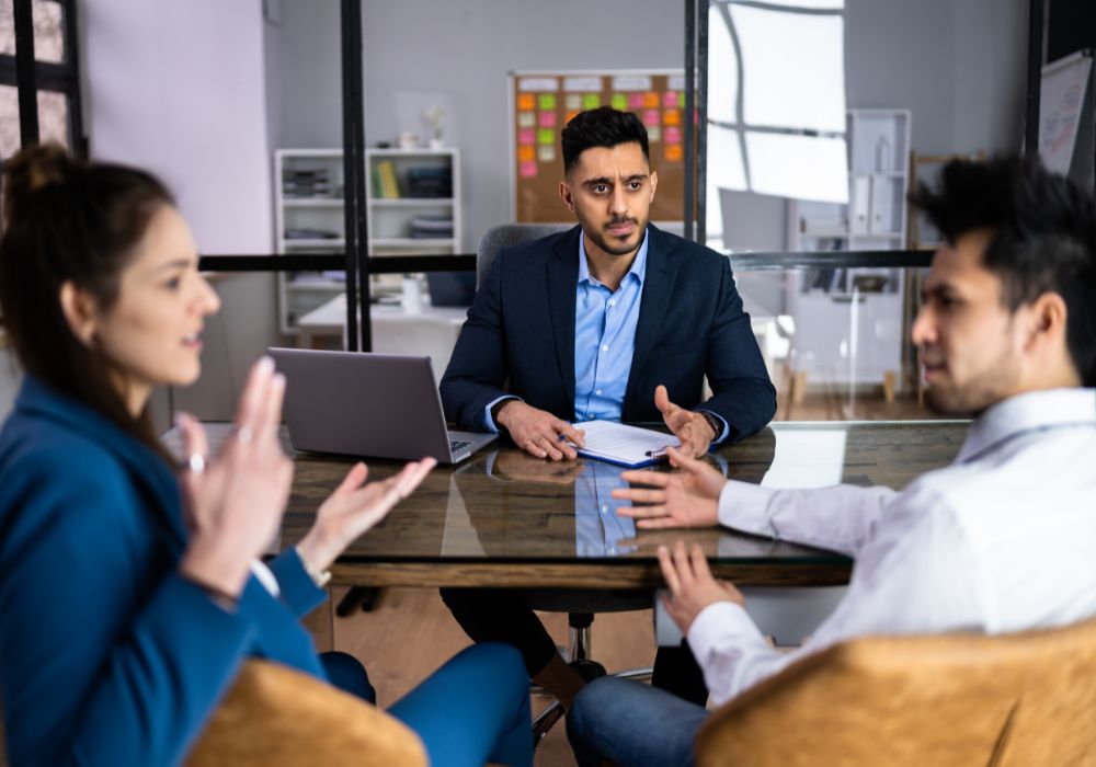 3 people going through a grievance procedures